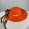 kapelusz letni plazowy z perelkami Laura Orange pomaranczowy polski producent strojow kapielowych LAVEL szarfa obok